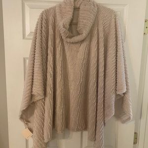 Beautiful NWT cream fur poncho with cowl neck